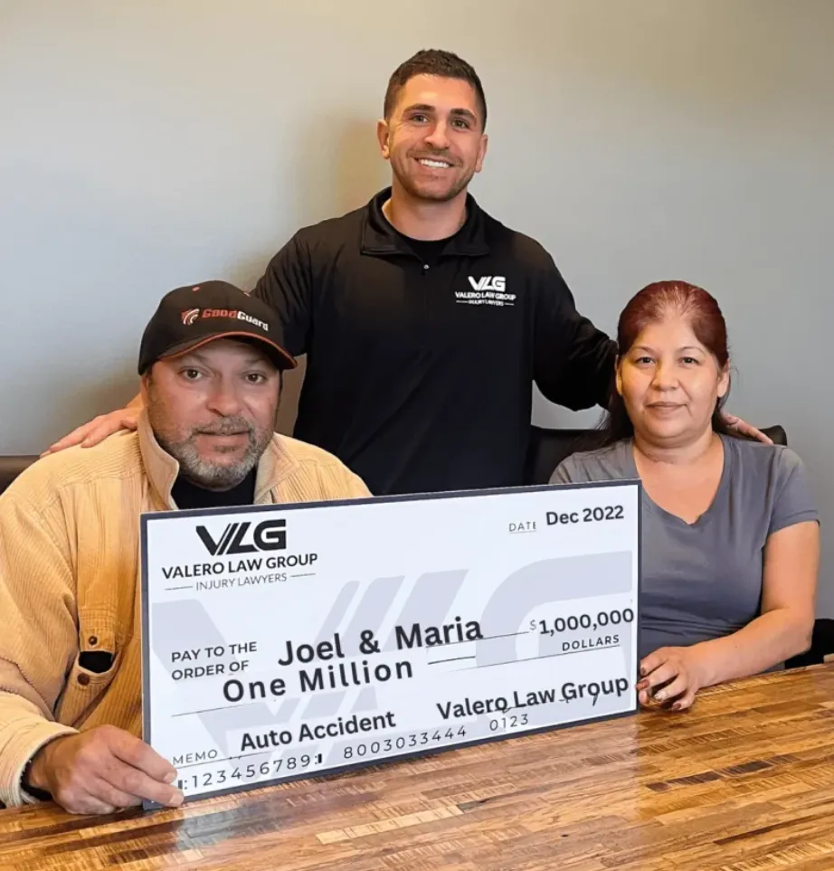 Joel and Maria with their $1 Million settlement check